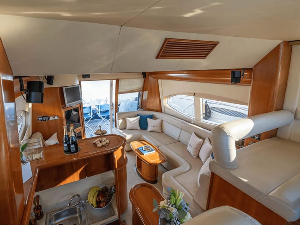 Saloon and galley bar of a Majesty 50, looking aft to the deck